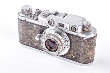Old vintage camera, white background. Rangefinder retro camera over white background.