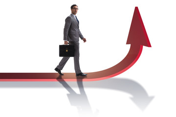 Obraz premium Young businessman in business concept with charts