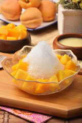 Shaved ice dessert with fresh mango            