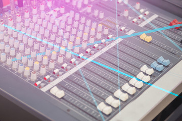 Professional sound and audio mixer control panel with buttons and sliders. Events parties style ,...