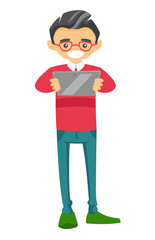 Young Caucasian white businessman in glasses reading news on portable digital tablet. Vector cartoon illustration isolated on white background.