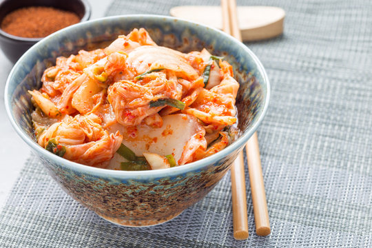 Kimchi cabbage. Korean appetizer in bowl, horizontal, copy space