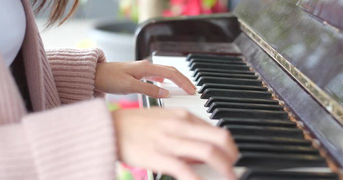 Female playing piano