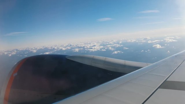 Traveling by airplane - vew through an airplane window