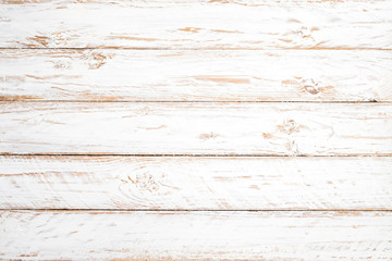 Fond de bois blanc vintage - Vieille planche de bois patinée peinte en blanc.
