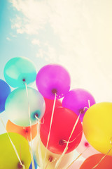 Colorful balloons done with a retro instagram filter effect. Concept of happy birth day in summer...