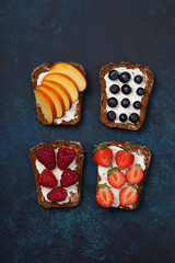 Toasts with cream cheese and fresh berries