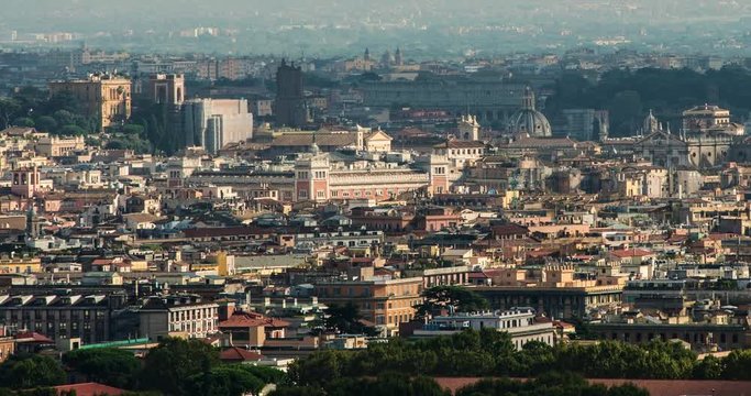 ROME, ITALY  – OCTOBER 2015 : Timelapse over central Rome cityscape with shadows moving and light changing during sunset