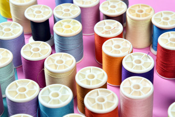 Thread rolls, Group of colorful thread on sewing desk, Craft, sewing and needlework concept.