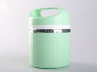 Tiffin or Tiffin carrier on a background.