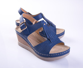 Naklejka premium shoe or female fashion sandal on background.