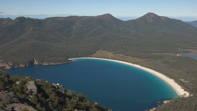 a medium shot of wineglass bay from mt amos in  freycinet national park on the east coast of tasmania, australia