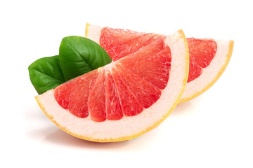 Grapefruit slices with leaves isolated on white background