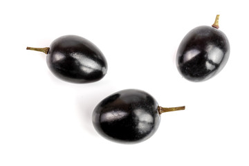 Dark grapes isolated on white background, top view. Flat lay