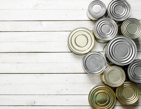 Tin cans with food.