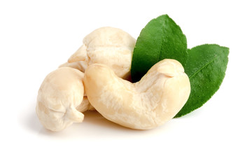 cashew nuts with leaf isolated on white background. macro