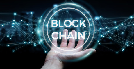 Obraz premium Businessman using blockchain cryptocurrency interface 3D rendering
