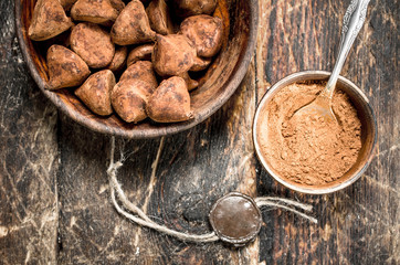 Chocolate truffles with cocoa powder.