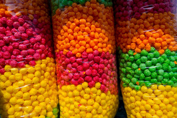 Food pellets for pets. Variety of colorful packaging in plastic