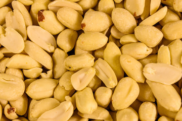 Texture of peeled roasted peanuts for the background