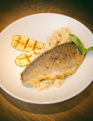 Plate With Grilled Fish, Rice And Sliced Squash