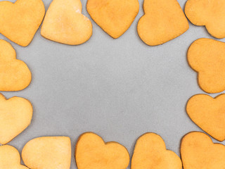 Homemade ginger biscuits in the shape of a heart. The view from the top. Place under the text. Template