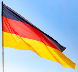 Flag of Germany against the blue sky