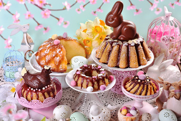 assortment of various ring cakes for easter on festive table