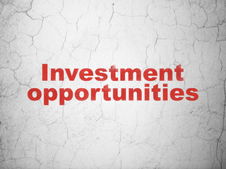 Business concept: Red Investment Opportunities on textured concrete wall background