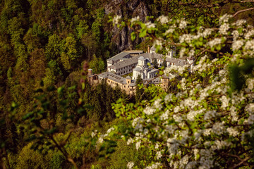 Beautiful spring view of Tismana monastery in Romania from the mountains above