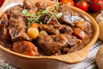 Beef Bourguignon stew served with baguette