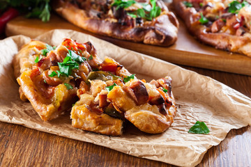 Traditional Turkish pide with meat and vegetables