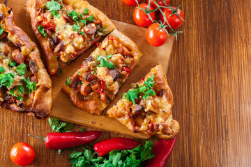 Sliced traditional Turkish pide with meat and vegetables
