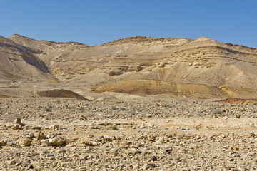 Fototapeta na wymiar Wadis and craters in desert