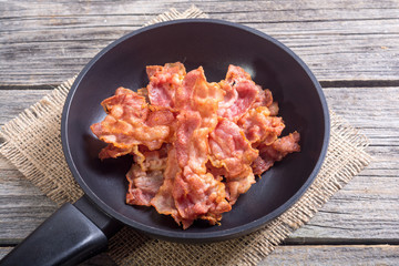 Sliced fried bacon
