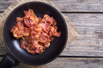 Sliced fried bacon