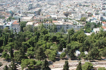 Fototapeta premium The landscape of the parks and streets of Athens, the capital of Greece, from the bird's-eye view.