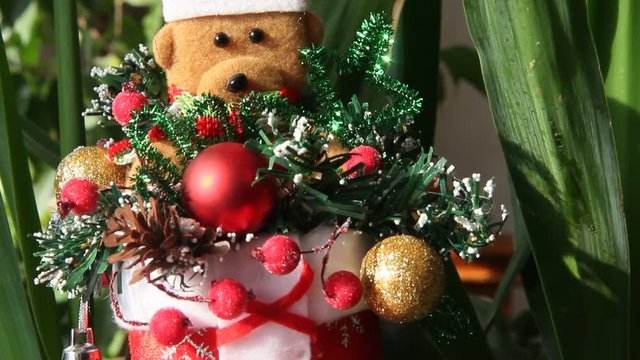 Christmas toy. Brown bear in a Santa Claus hat.
