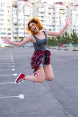 Redhead Hipster Girl Jumping