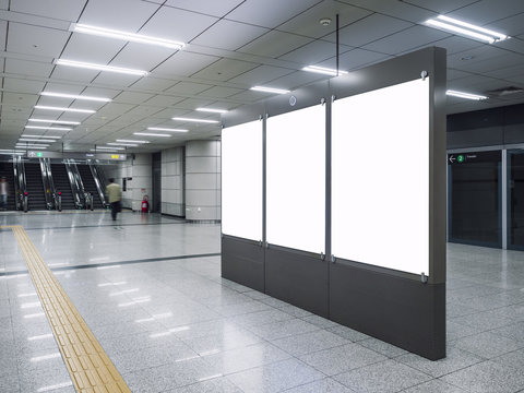 Mock up Blank Banners in Subway station with blurred people Travel