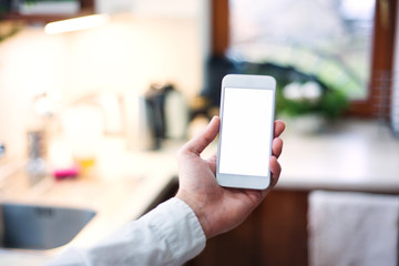 Mockup image of smartphone with blank white screen.