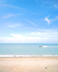 Clear beach view with a boat pass by, Penang island
