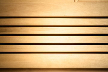 Light wooden wall in sauna. Natural background texture. Toned