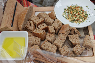 Bread. Pieces of healthy rye bread and spices for melting