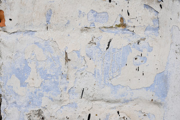 Wall fragment with scratches and cracks