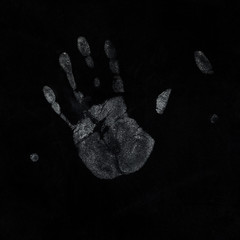 seamless real dirt left hand print on black background