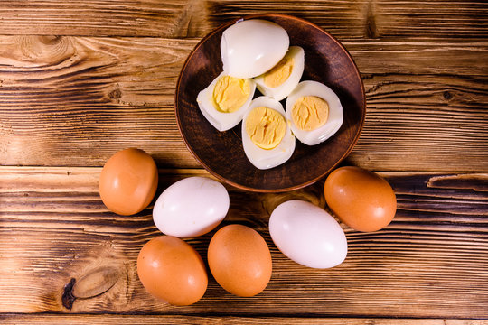 Boiled eggs on the old wooden table