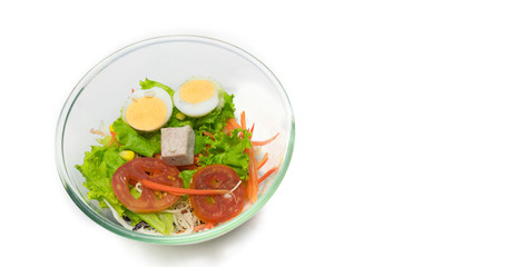 Healthy Vegetable Salad in Transparent Cup contains tomato, rice, potato, green vegetables on a white background.isolated on white 