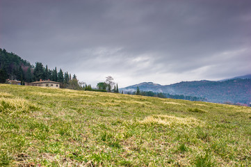 Beautiful landscape of Tuscany coutryside with stormy weather