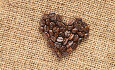 coffee beans in heart shape on sack